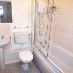 Bathroom with shower over bath in property to rent near Milton Keynes